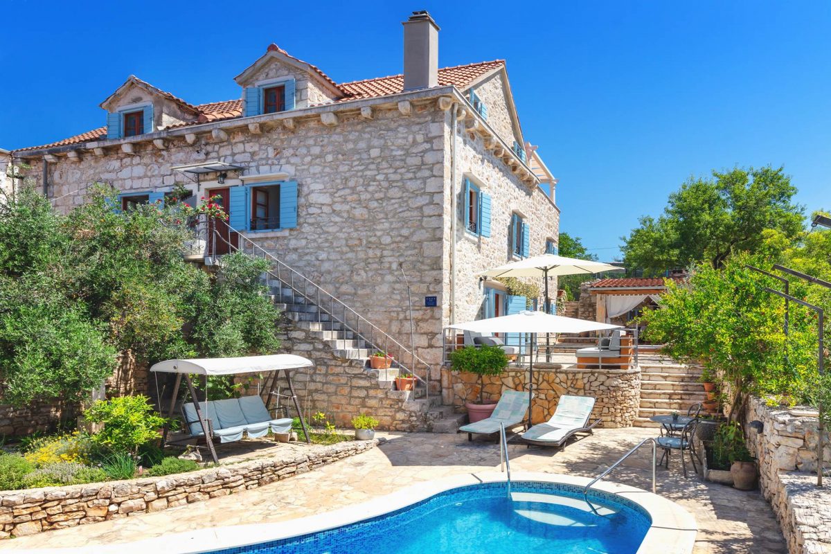 Sunlit Villa Vicina with beautiful greenery, private swimming pool, bed chairs and parasol